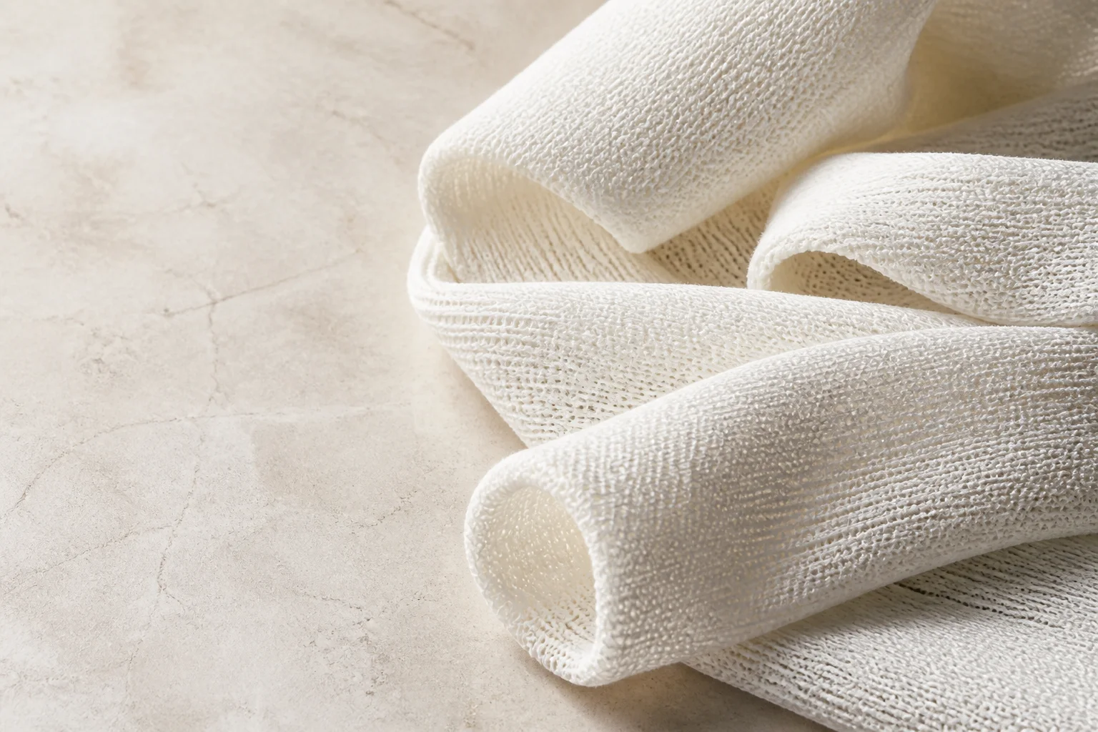 Close-up of premium knitted cotton stockinette showing its material texture